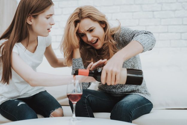 woman fights with friend over alcohol use brought on by cycle of alcohol and anxiety